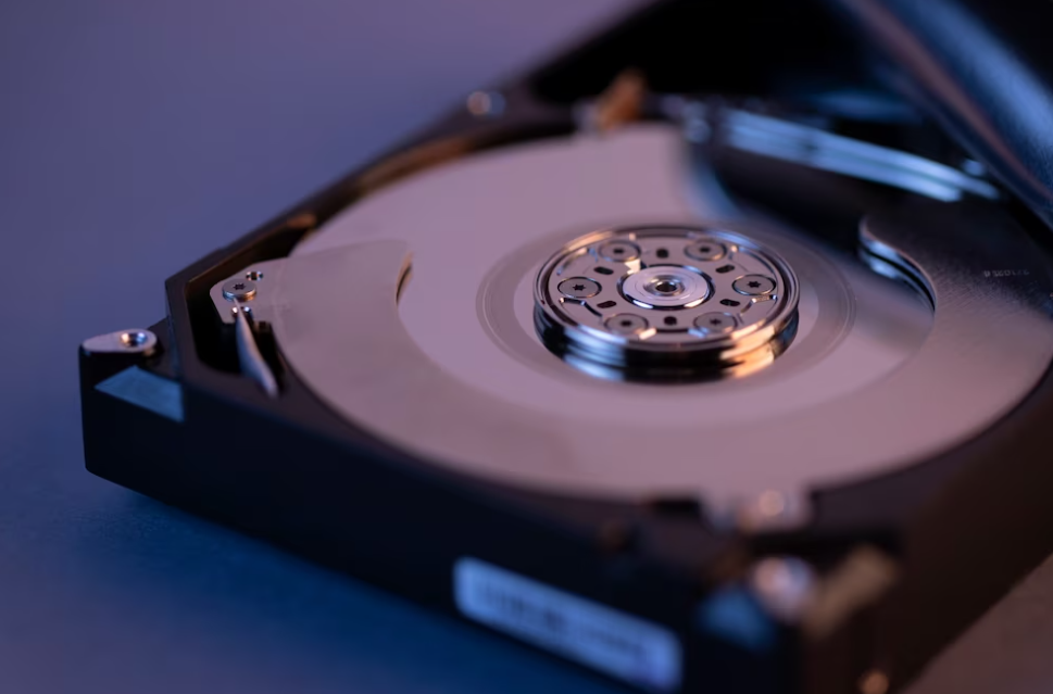 close-up view of hard drive on dark blue table